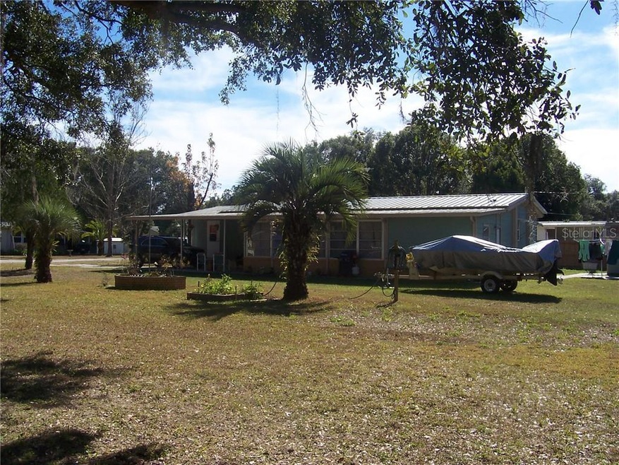 Beautiful Exterior setting on almost .50 acre! Boa