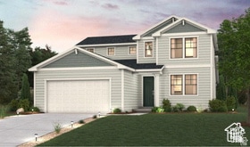 View of front of home with a front yard, driveway, and an attached garage