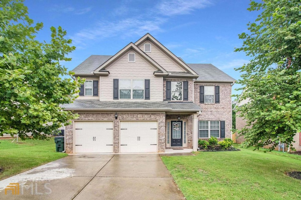 4021 Village Crossing Cir, Ellenwood, GA 30294 - photo 1