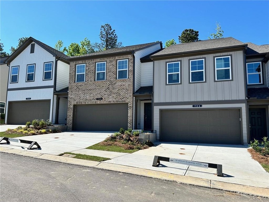 View of front of property with a garage