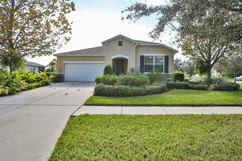 Beautifully landscaped front yard with 8ft entrywa