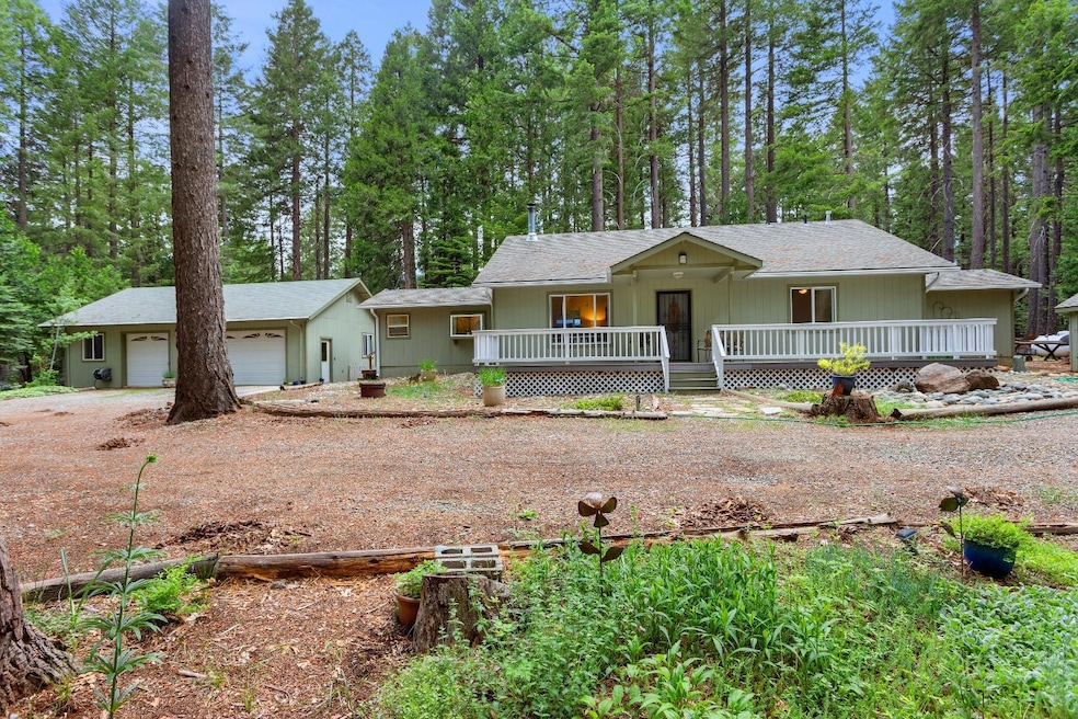 Front of the home, and detached garage to the left
