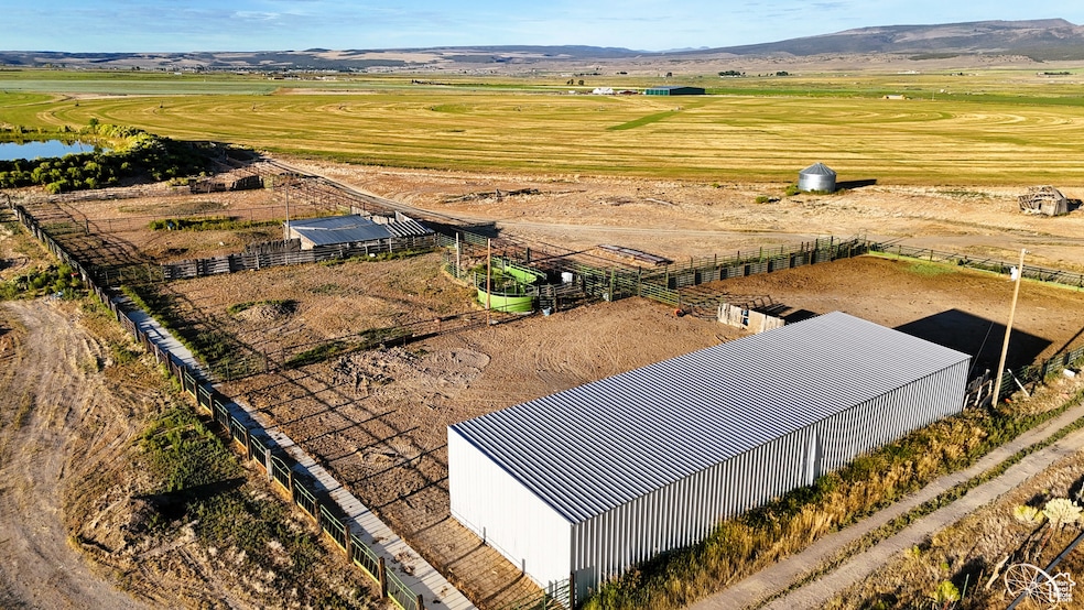 Overview of rural landscape with a mountain backdrop