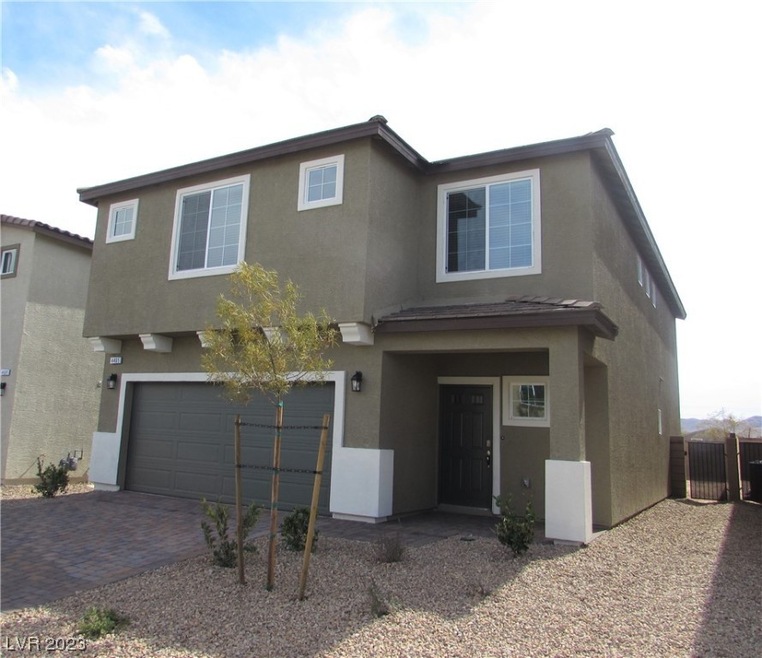 2665 plan front elevation. Finishes are representa