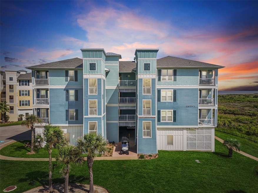 Experience unforgettable sunsets from your private balcony—this Pointe West retreat shines day or night with its coastal charm and prime location.