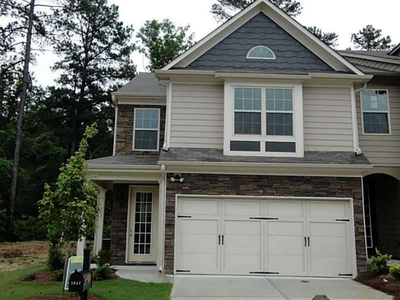 Exterior Front. Stock photo of the same elevation.