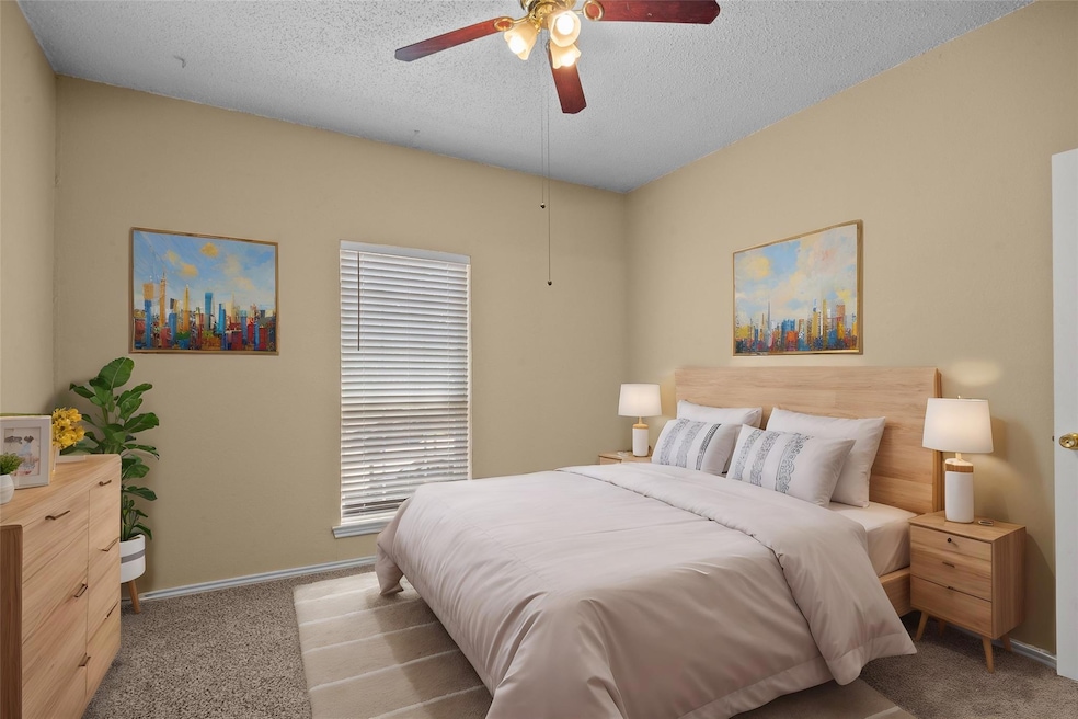 Virtually staged primary bedroom.