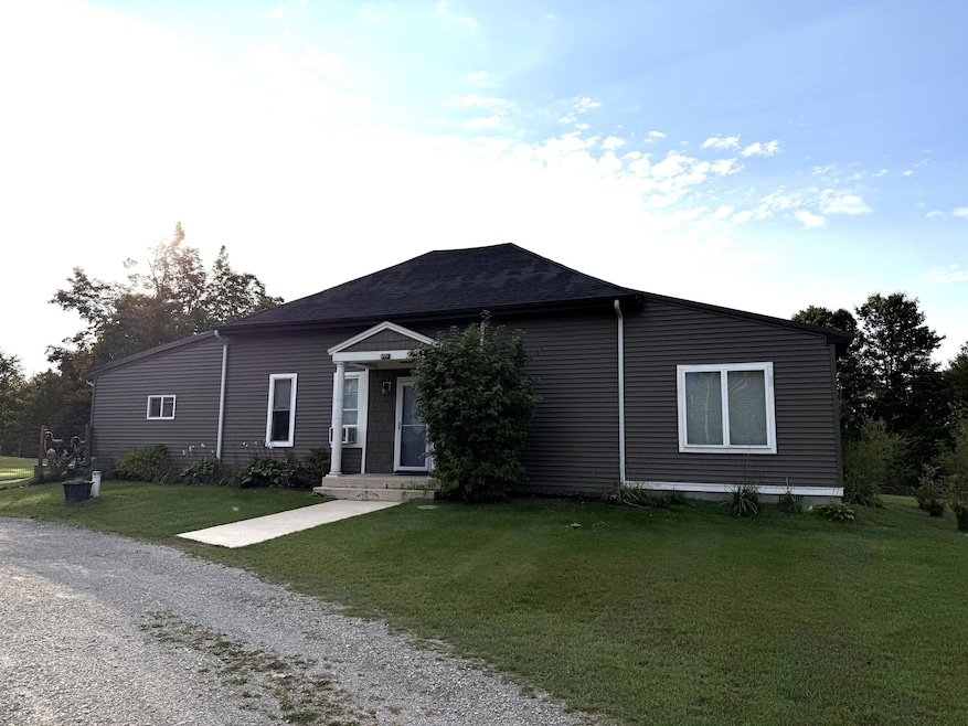 7490 S River Rd, Cheboygan, MI 49721 - photo 1