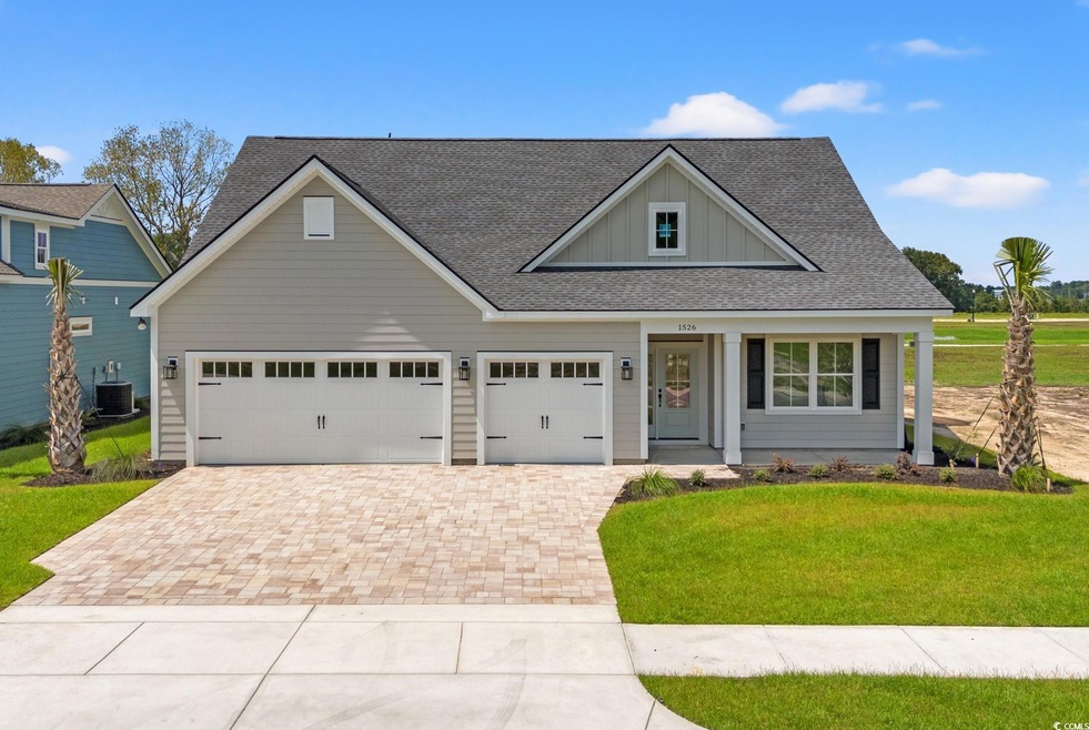 Craftsman inspired home with a garage, central air