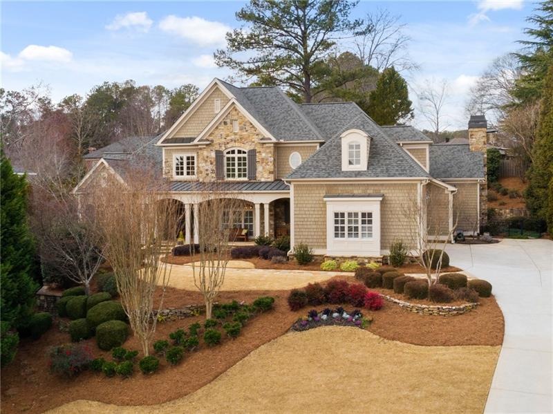 Custom-built home with stone and cedar shake exter