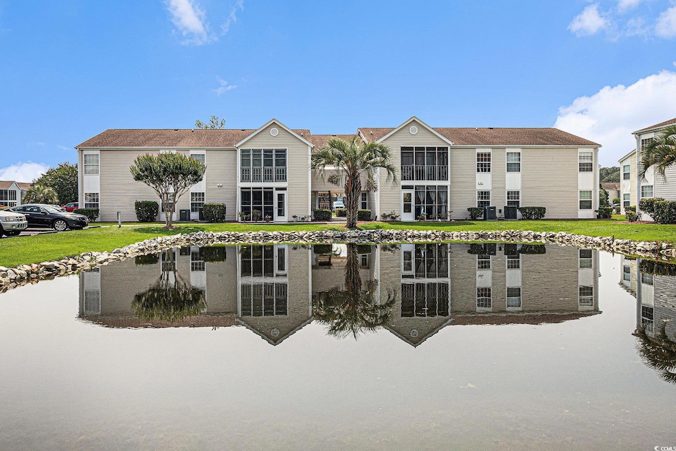 View of property featuring a water view