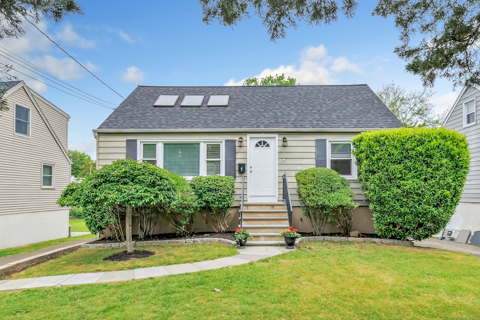 Charming, updated cape in quintessential neighborhood.