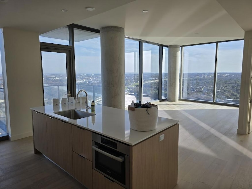 Kitchen with modern cabinets, a kitchen island wi