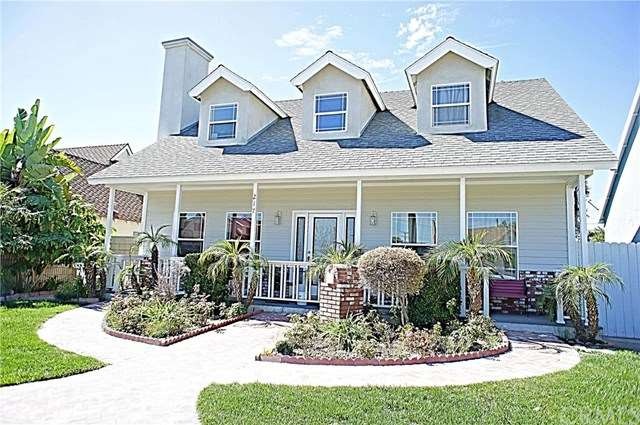 Beautiful curb appeal with manicured landscaping