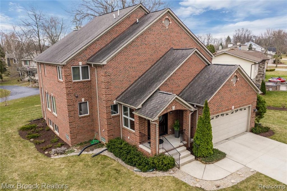 2421 Walnut Lake Rd front facing Naneva Ct.