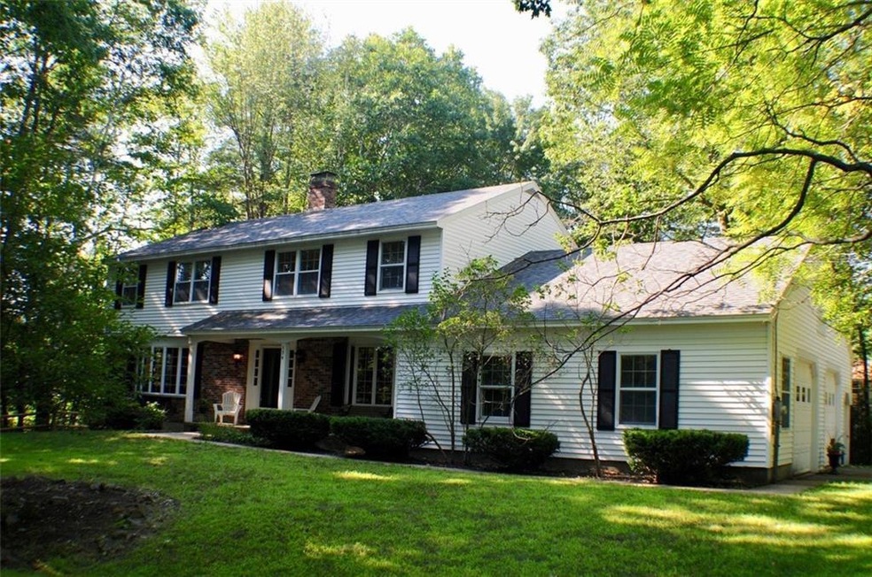 Exterior with large front lawn