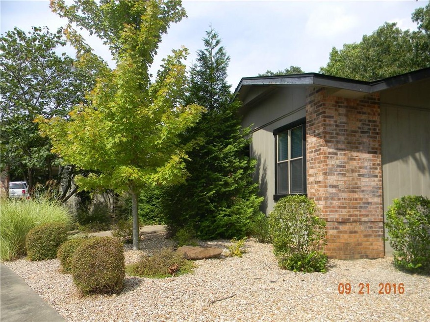 Front Entry with Beautiful trees and Shrubs