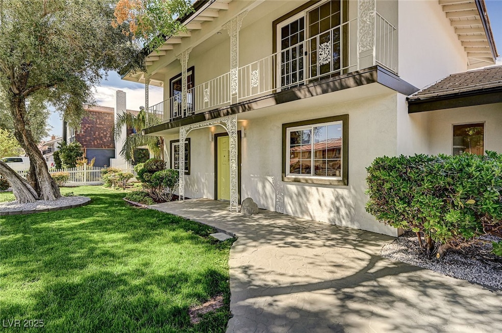 Front of house with fully enclosed front yard with
