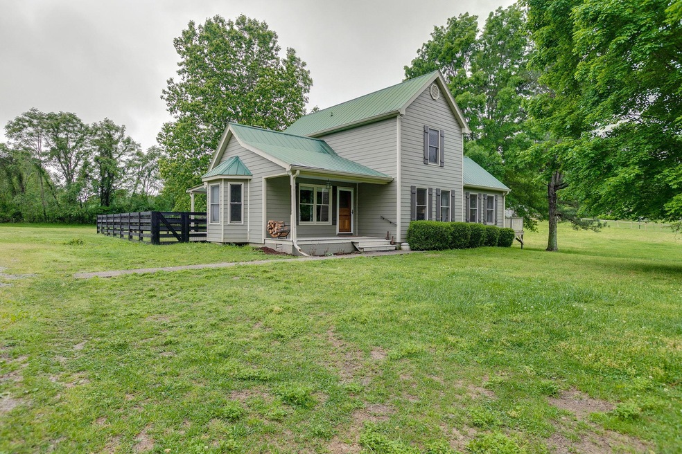 Beautiful Farmhouse completely fenced in on 3.23 acres