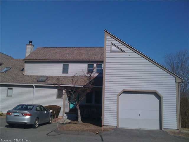 Exterior Front. End unit with attached garage plus