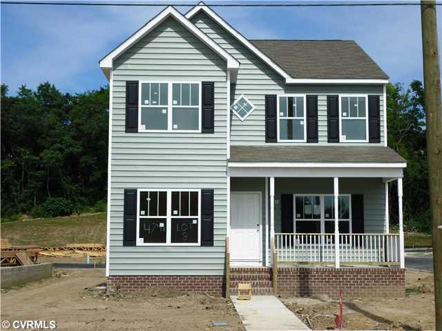 Exterior Front - Photo is of a previously built ho