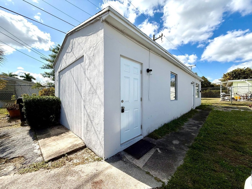 902 42nd St unit 1/2, West Palm Beach, FL 33407 - photo 1