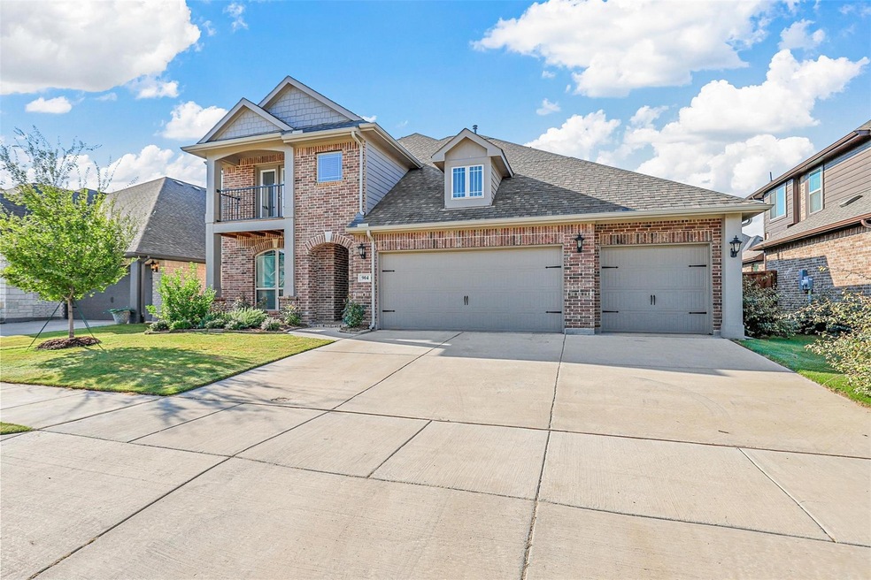 Gorgeous home with 3 car epoxy floored garage.