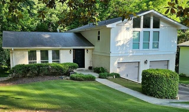 Well Maintained Tri-level home featuring brick sid