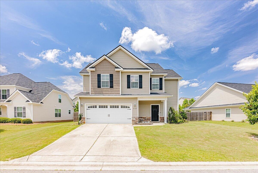 This charming two-story home features a