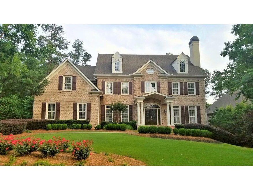 Prisitine 4-sided Brick home located in a quiet cu