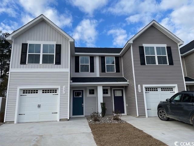 View of front facade with a garage