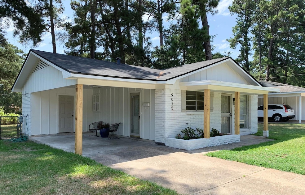 Ranch-style home featuring a front yard