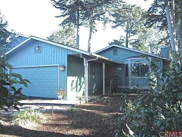 Nestled in the trees, you'll find this comfortable