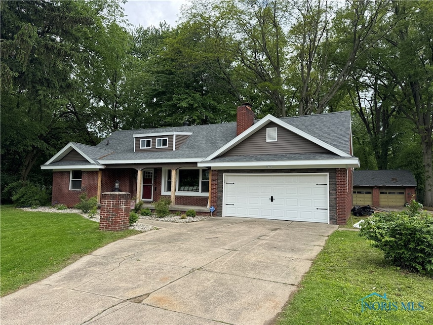 NEW ROOF, NEW DOORS, NEW SIDING!