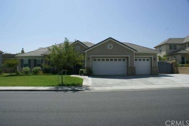 Single Story with highe 8ft garage door openings.
