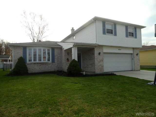 Exterior Front Spacious 4 Bedroom Home with mainte