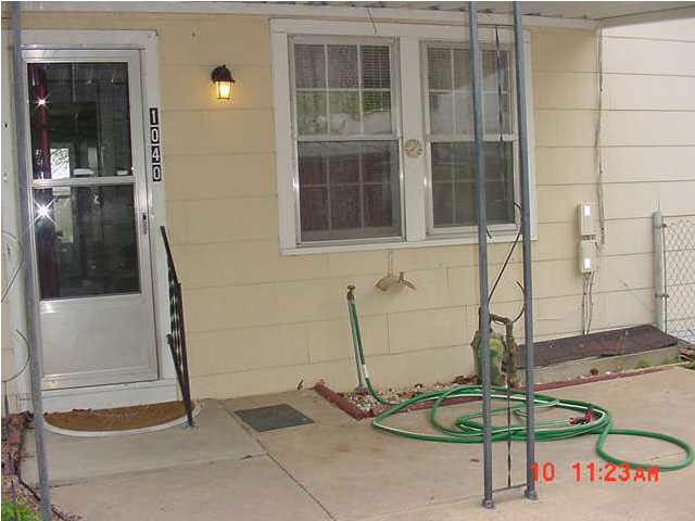 Back Entrance (closest to parking). Covered Patio.