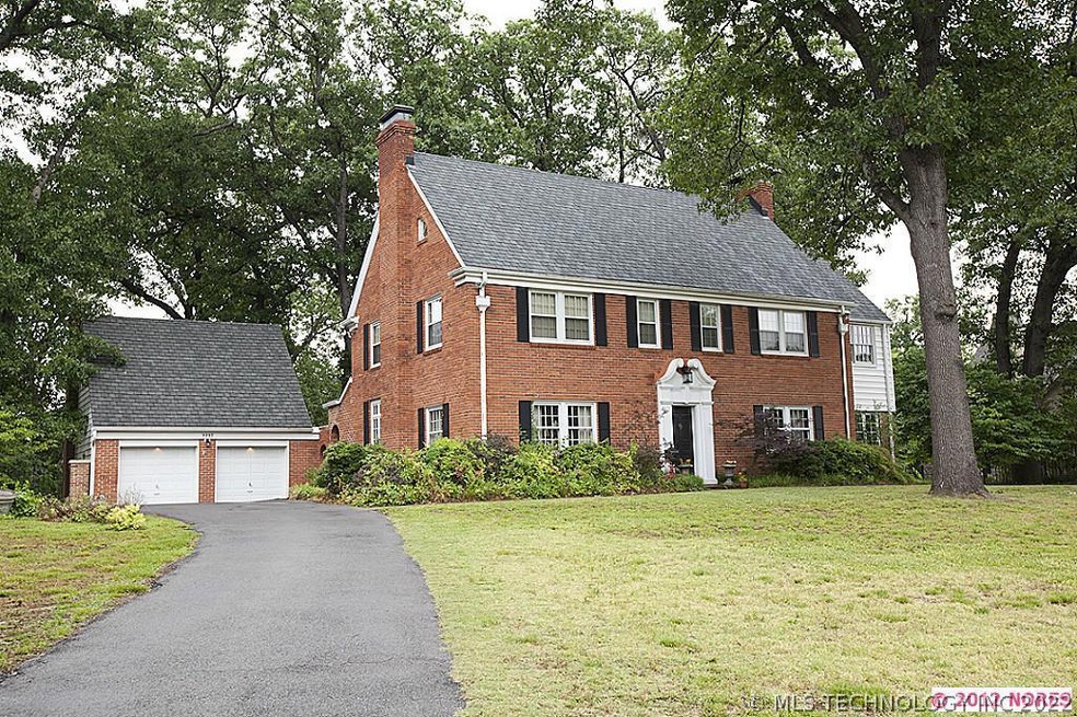 Stately Colonial residing on approximately .878 ac