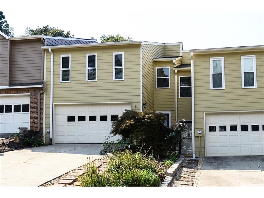 This well maintained East Cobb Townhouse with attr