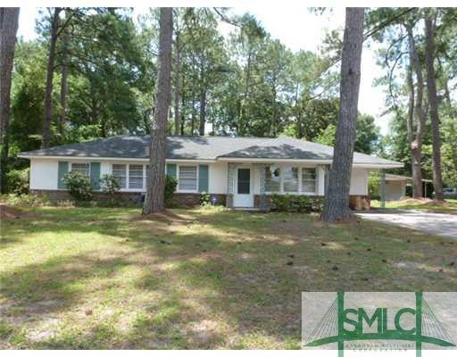 Exterior Front. Brick home on large corner lot