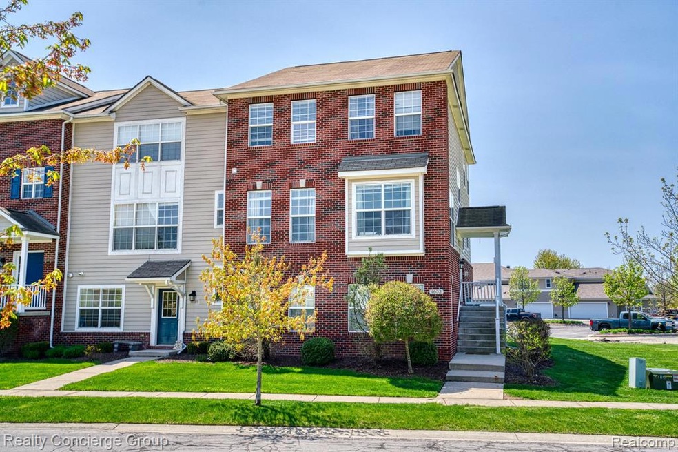 1632 Town Commons Dr unit 105, Howell, MI 48855 - photo 1