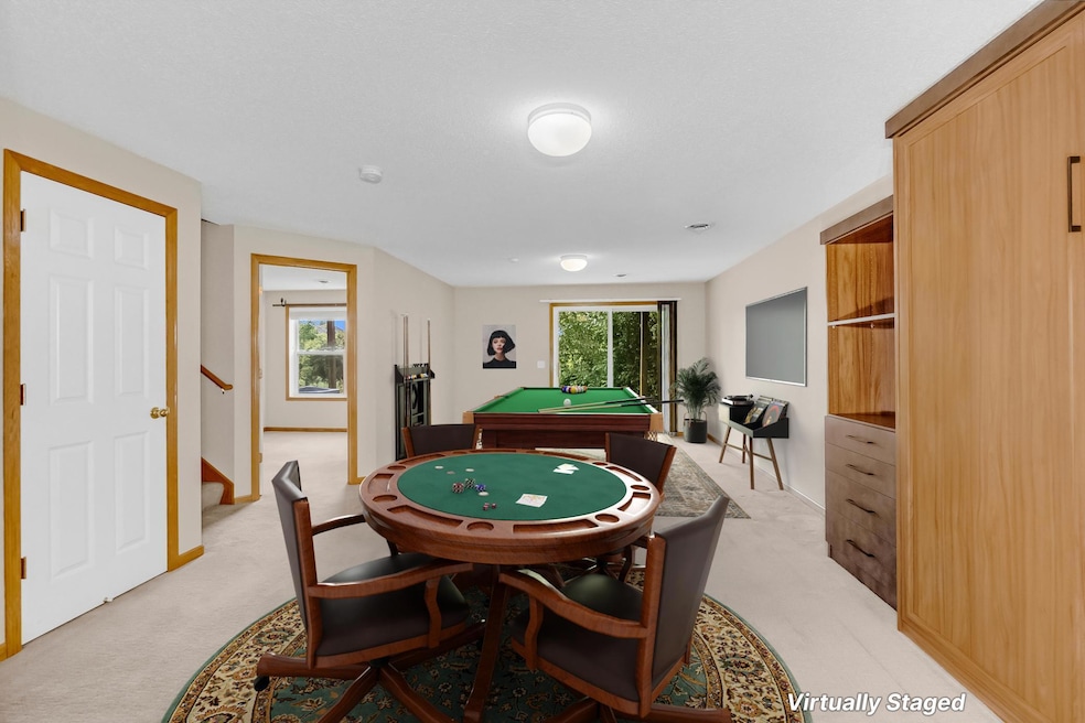 Virtually staged lower level entertainment area