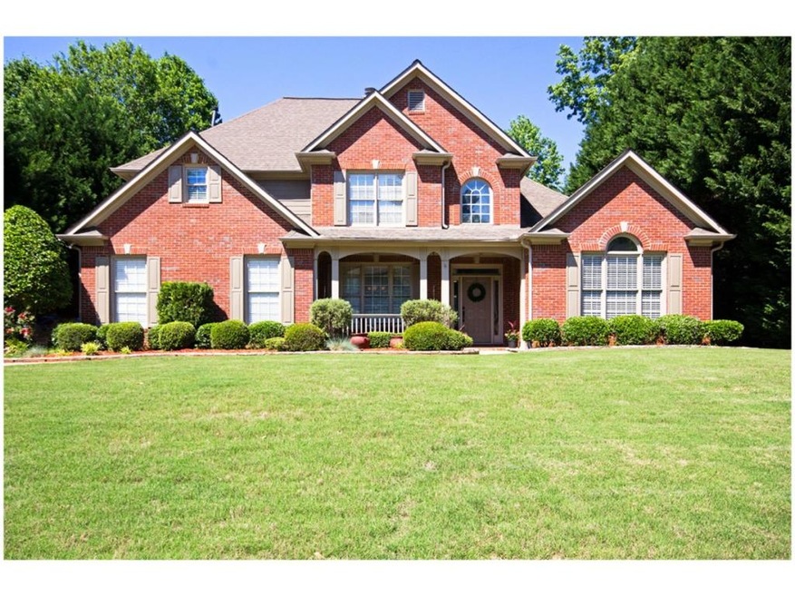 Amazing curb appeal with this well manicured lawn