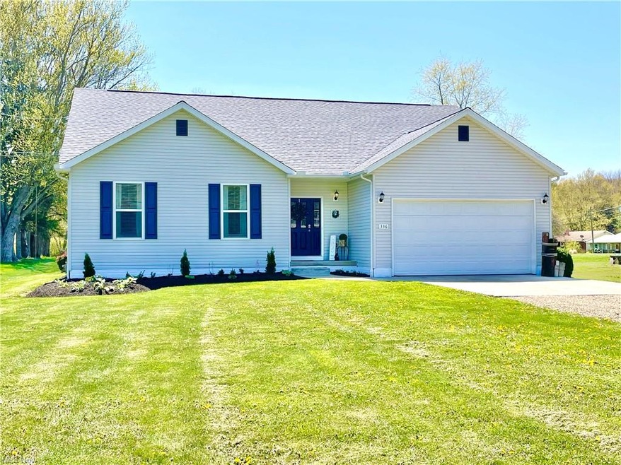 This modern Cape Cod combines ranch styling with c