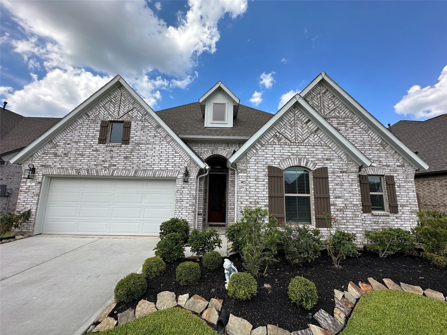 Be welcomed home by outstanding curb appeal with a traditional brick elevation, a two car attached garage and beautiful landscaping.