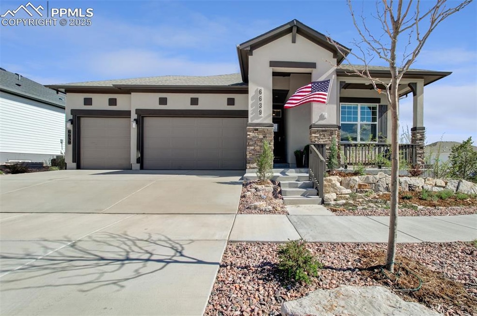 Upgraded front elevation includes stucco and stone