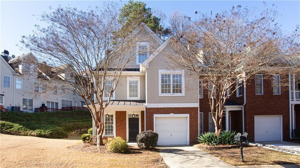 Front of property featuring a garage