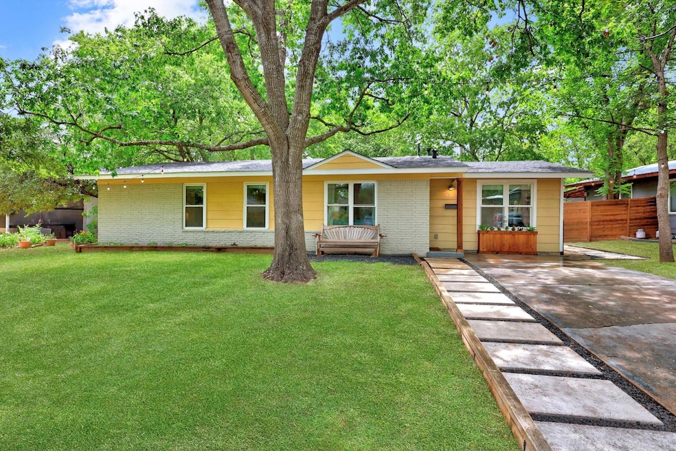View of front of property featuring brick siding 
