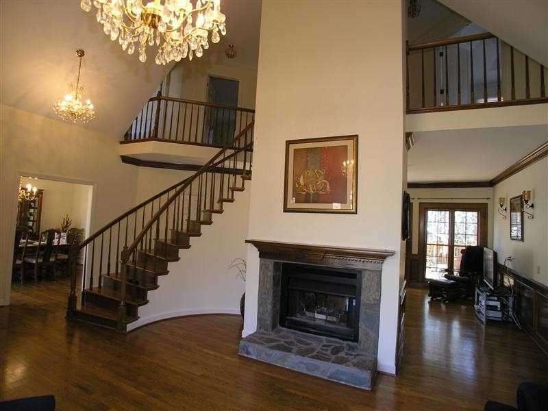 Exterior Front. Stunning Curved Custom Built Stair
