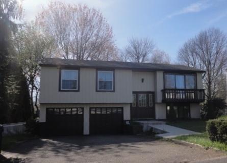 Exterior Front. This split entry has plenty of par